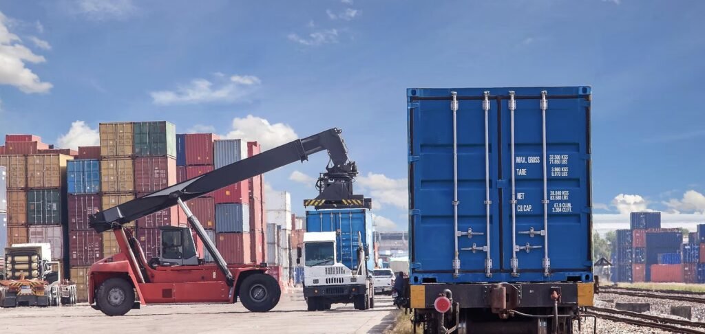 Containers being loaded at an inland rail terminal in India, illustrating the FEMA 2026 export rule change effective 1 October 2026